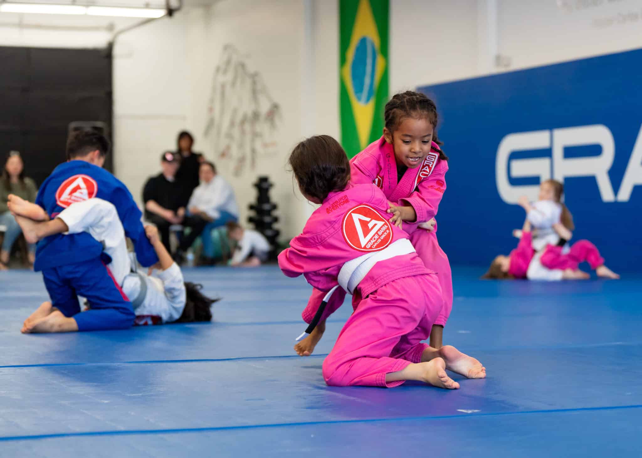 Children having fun while building fitness through BJJ